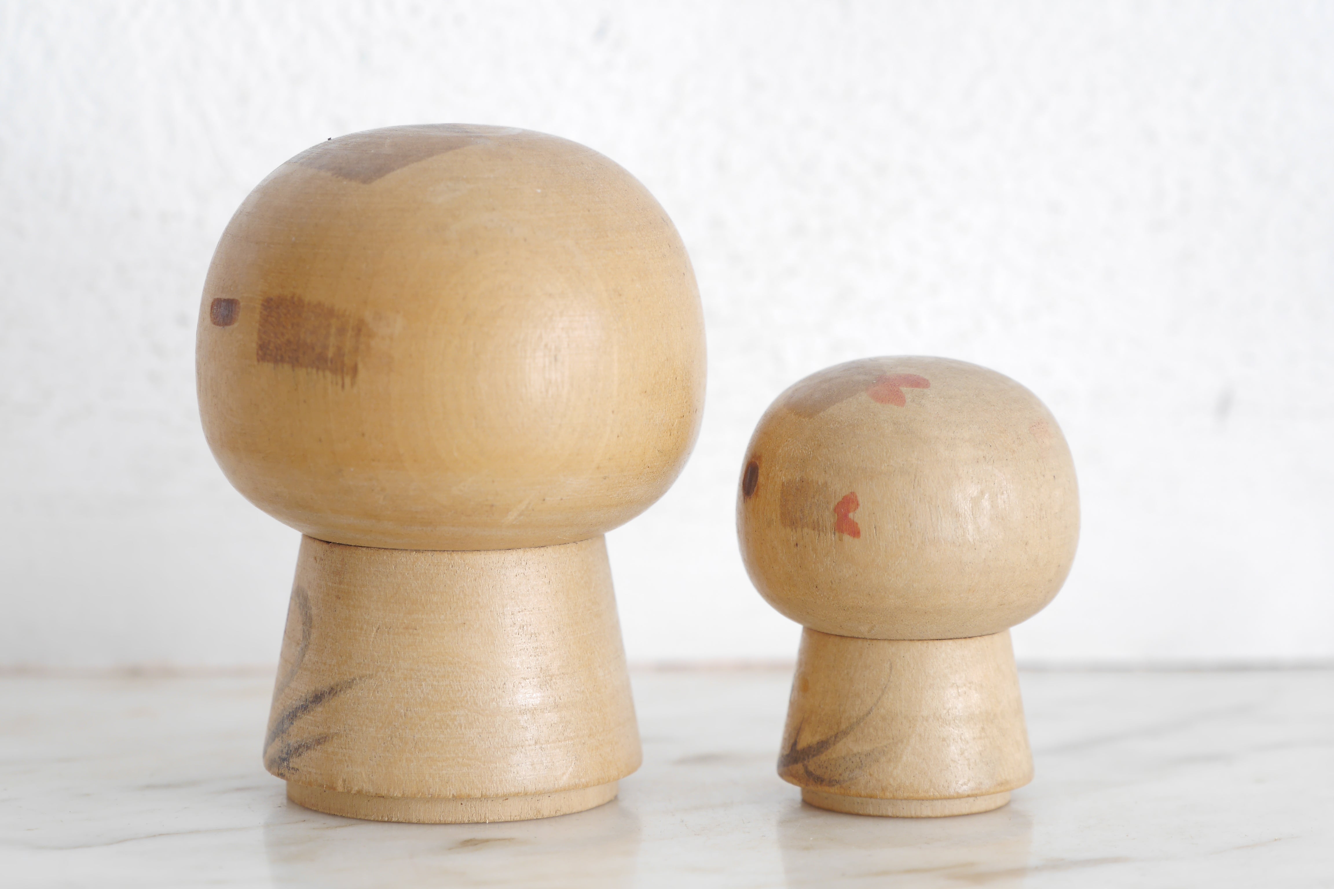 A lovely Pair of Vintage Creative Kokeshi By Sanpei Yamanaka